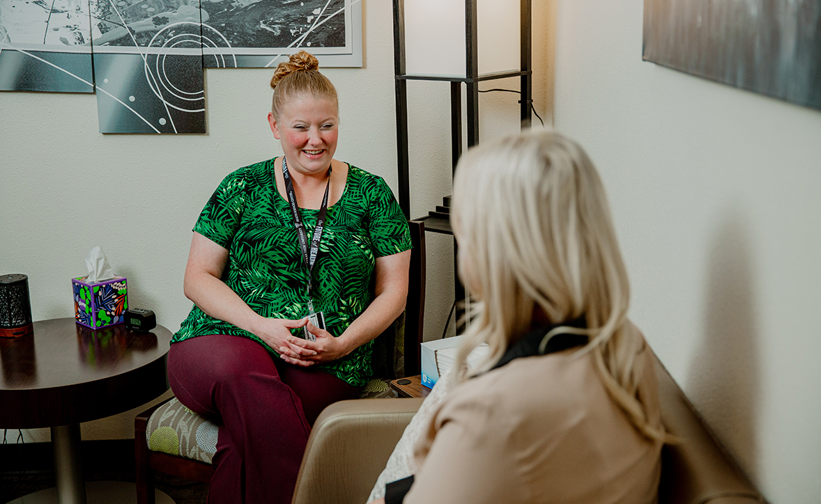 Counselor with patient in counseling room